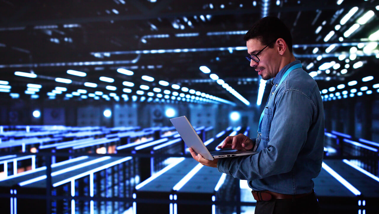 Man Laptop in Data Server